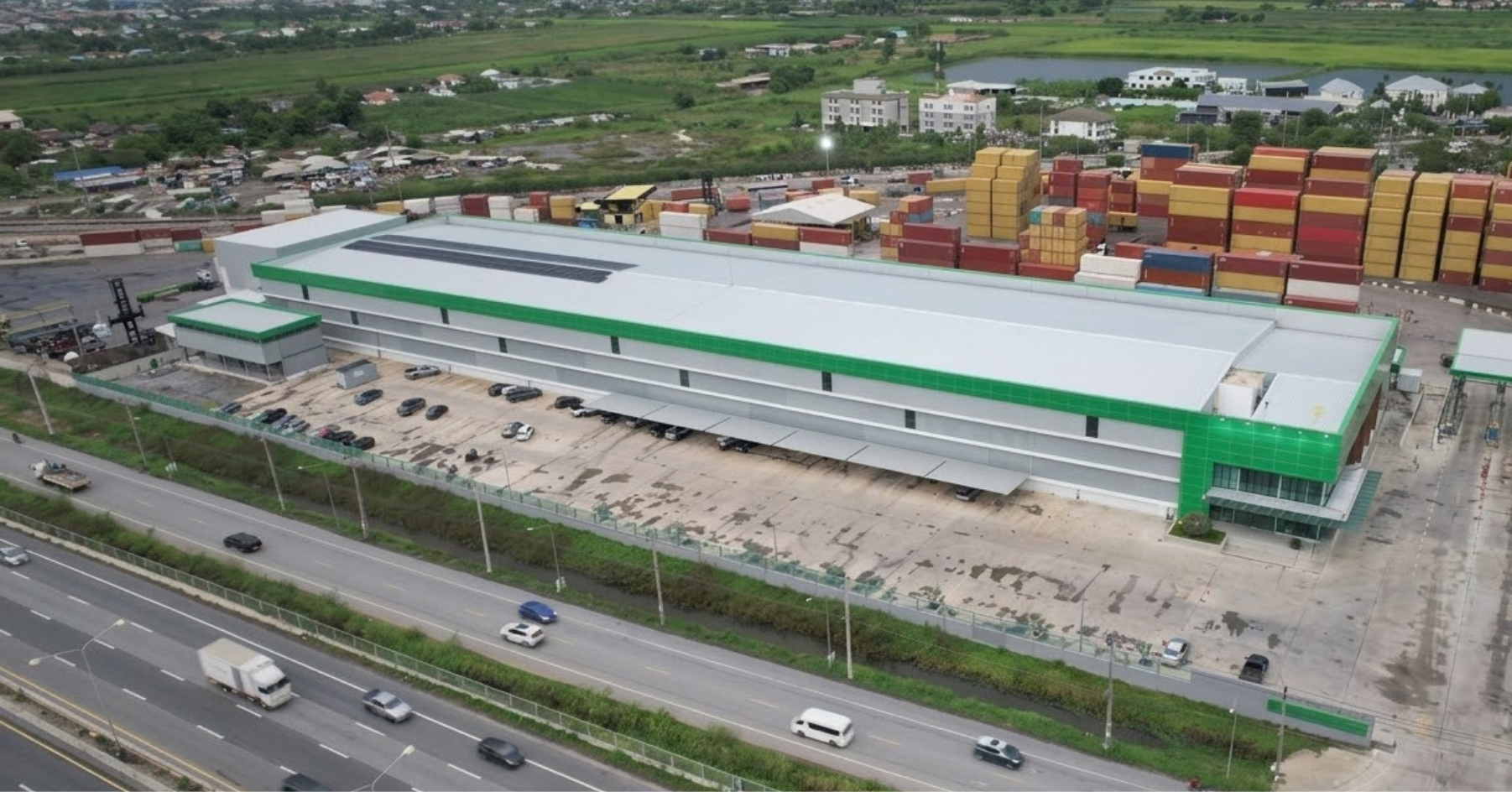 Aerial container yard connected to logistics routes